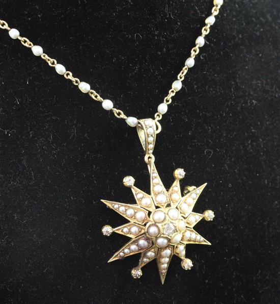 An Edwardian gold, split pearl and diamond set starburst pendant brooch, pendant brooch 1.5in excl. bale.
